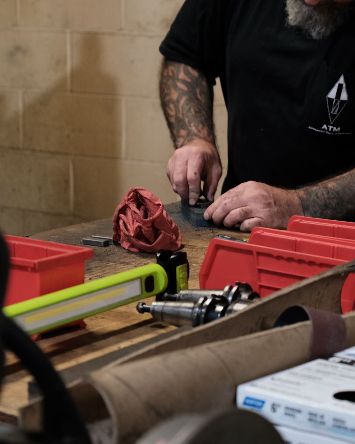 Hand-fitting a tool at the bench at Advanced Tool & Machine